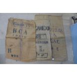 Approximately twenty-eight vintage burlap sacks