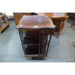 An Edward VII mahogany and satinwood inlaid revolving bookcase