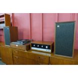 A Garrard 401 turntable, a pair of Wharfedale speakers and a J.E. Sugden Class A stereo amplifier,