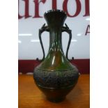 A Chinese verdigris coloured bronze two handled vase