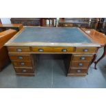 An early 20th Century mahogany partners library desk