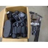 A collection of cameras including Praktica Pentax, Emi K.35, two pairs of binoculars and a