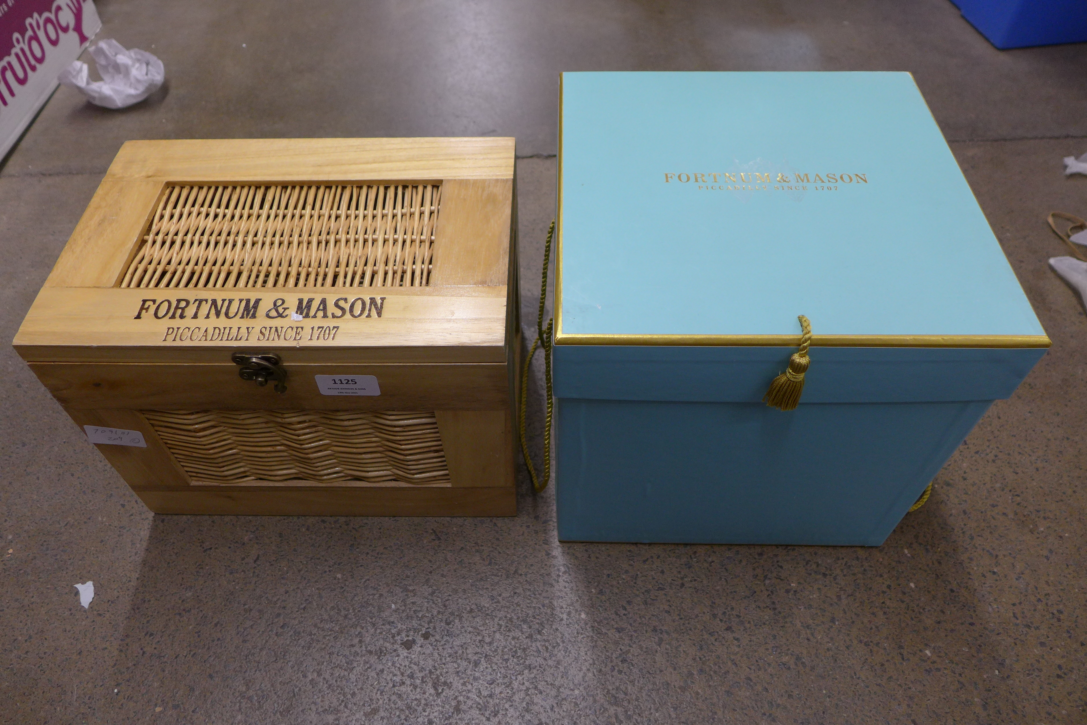 A Fortnum and Mason wood and wicker box and another packaging box