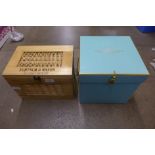 A Fortnum and Mason wood and wicker box and another packaging box