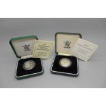 A Royal Mint 1992 silver proof Piedfort 10p coin and a 1995 silver proof £2 Dove of Peace