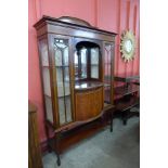 An Edward VII inlaid mahogany display cabinet