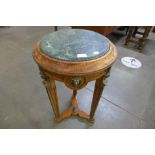 A French Louis XV style walnut, gilt metal and marble topped gueridon table