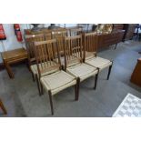A set of six Danish Mogens Kold teak and paper card seated dining chairs, designed by Arne Hovmand