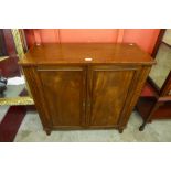 A Victorian mahogany two door enclosed bookcase