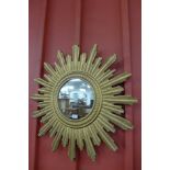 A gilt framed sunburst mirror