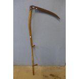 A vintage elm scythe