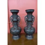 A pair of Chinese bronze vases