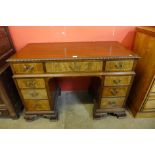 An early 20th Century Chippendale Revival mahogany desk