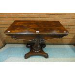 A Regency rosewood rectangular fold over card table