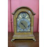 An early 20th Century German Winterhalder & Hofmeier walnut and brass mounted bracket clock