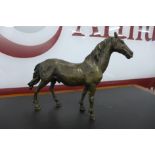 A bronze figure of a stallion