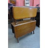 An Edward VII inlaid mahogany two tier Sutherland table