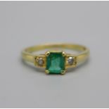 An 18ct gold, emerald and diamond ring, marked 18k, 2.6g, O