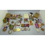 A collection of medals; WWI Victory Medal and 1914-15 Star to 154033 R.H. Trout C.P.O. R.N.; a WWI