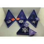 Four Swarovski Christmas ornaments; 2002, 2003, 2005 and 2006