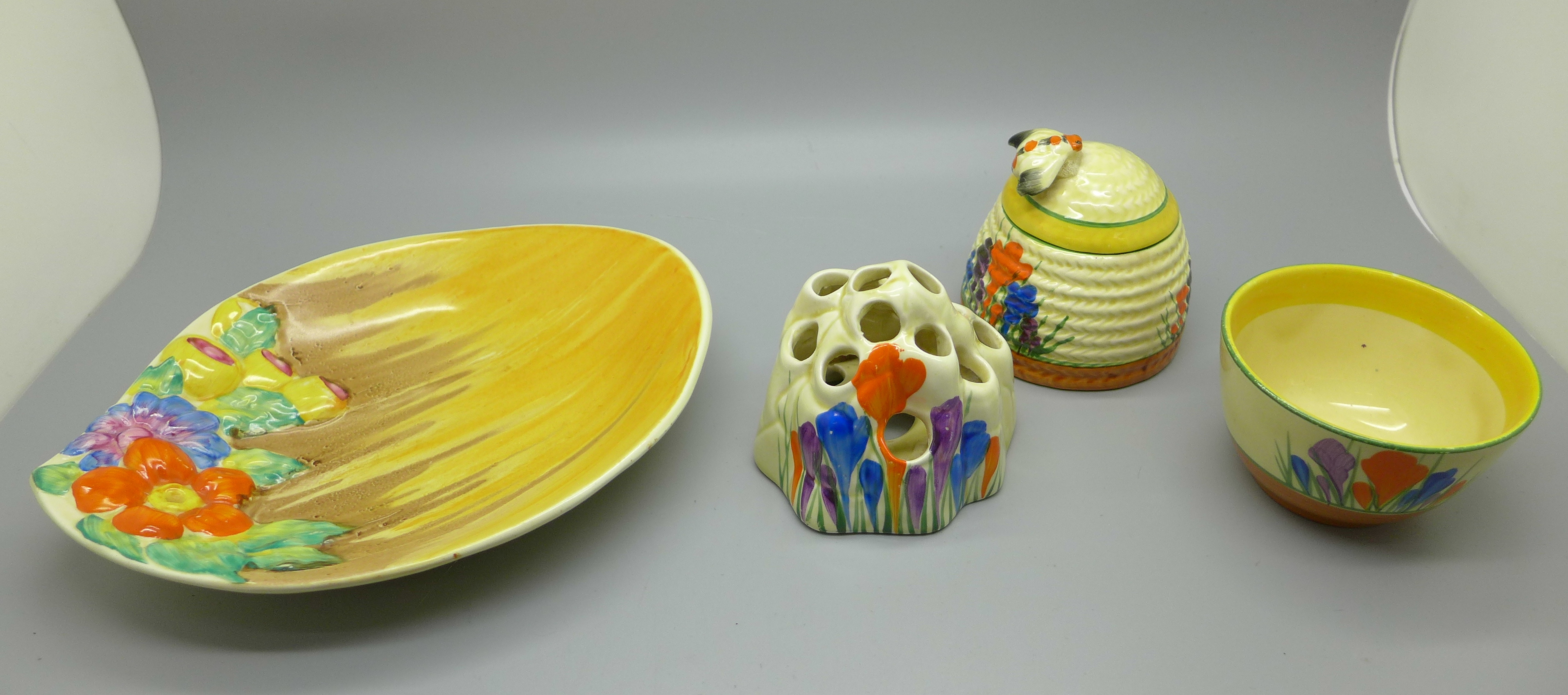 Clarice Cliff Crocus Bizarre bowl, beehive honey pot, flower stand and a Clarice Cliff honey glaze