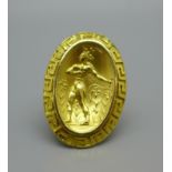 An 18ct gold ring depicting a Greek God and with meander border, 9.7g, I, top 20mm x 28mm