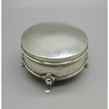 A circular silver box, diameter 53mm