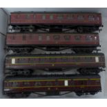 Four OO gauge Airfix railway carriages (maroon)