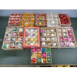 A collection of vintage glass Christmas baubles, ten boxes
