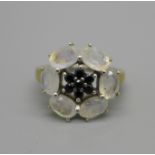 A silver gilt, rainbow sapphire and black spinal cluster ring, with certificate, L