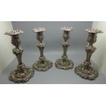 Four matching old Sheffield plate candlesticks with original sconces, circa 1830, 21cm