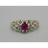 A 9ct gold, ruby and white stone cluster ring, 2.9g, N