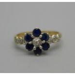 A 9ct gold ring set with blue and white stones, 2.1g, Q