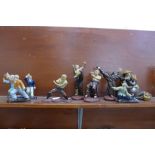 A collection of nine oriental figures, Tai Chi, Martial Arts and one fisherman, one a/f