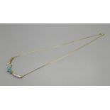 A 9ct gold necklace set with blue stones, 5.5g