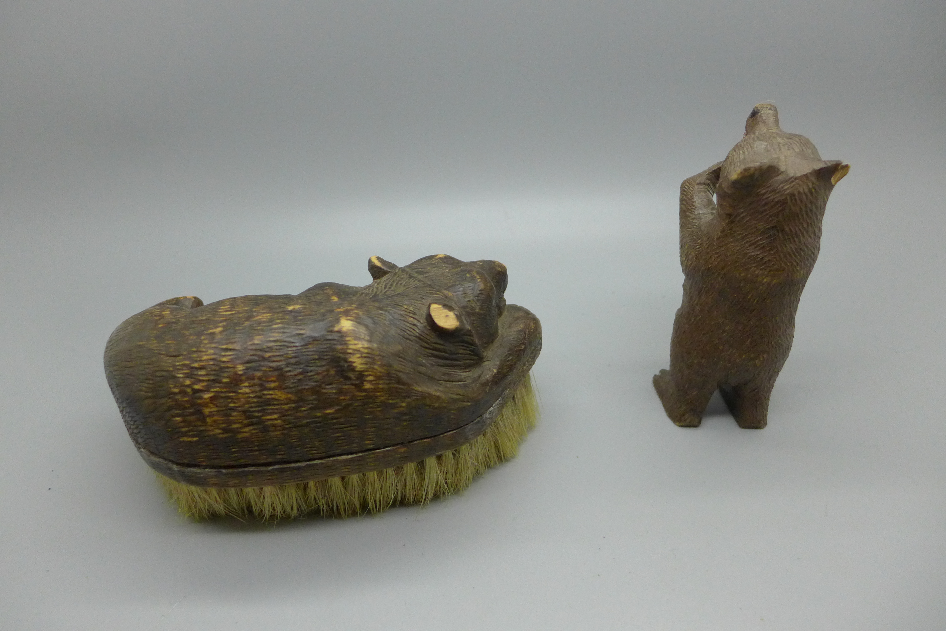 Two carved wooden Black Forest bears, one with brush, both with small losses - Image 2 of 3