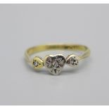 An 18ct gold, platinum set diamond ring, 1.6g, L