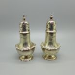 A pair of James Dixon & Sons silver shakers, 114g