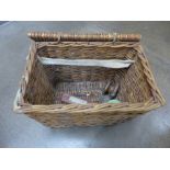 A fishing basket containing floats and a reel **PLEASE NOTE THIS LOT IS NOT ELIGIBLE FOR POSTING AND