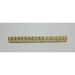 An 18ct gold, thirty-four stone diamond bar brooch, 5.5cm, 8.6g, 2.50ct total diamond weight, with
