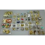 Fifty-seven pairs of screw and clip-on earrings