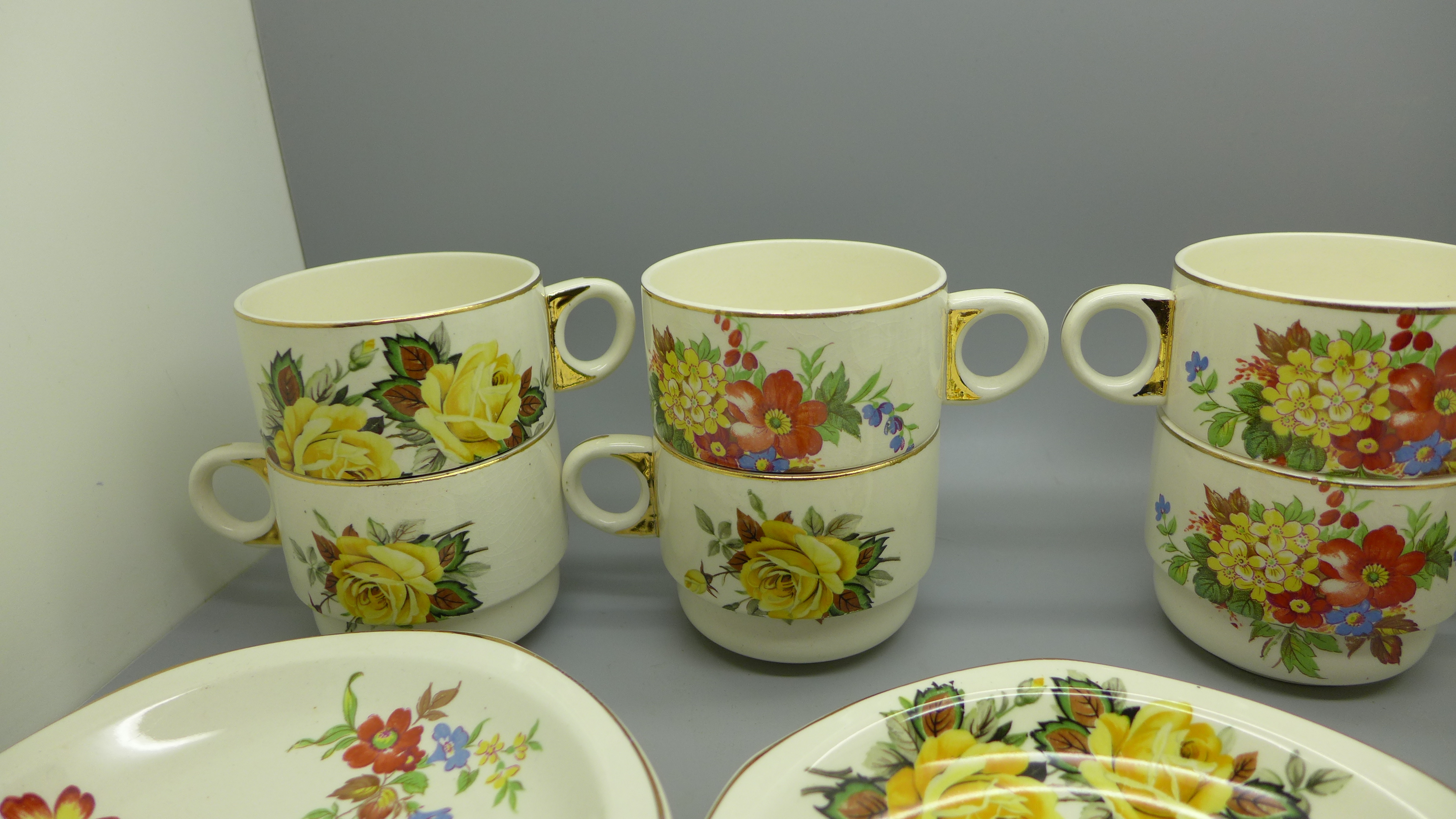 Eight Brexton Pottery cups and saucers decorated with flowers - Image 3 of 4