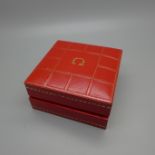 An Omega wristwatch box, hinge a/f