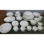 A Coalport Fragrance tea and dinner service, 48 pieces and two Wedgwood calendar plates