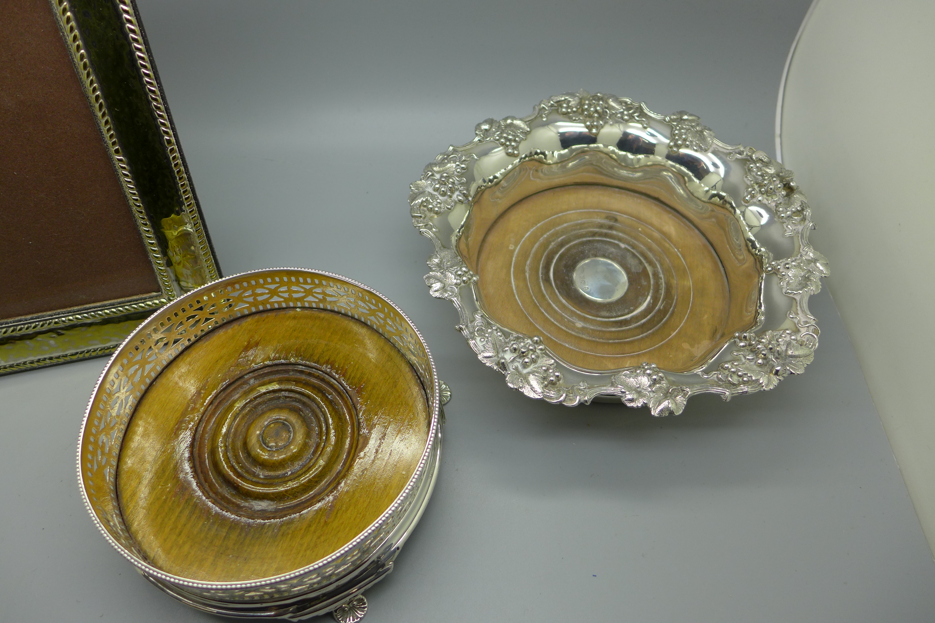 A 19th Century plated wine coaster with silver centre, a plated wine coaster and a plated photograph - Image 2 of 4