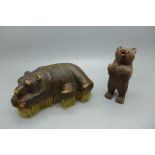 Two carved wooden Black Forest bears, one with brush, both with small losses