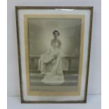 A framed black and white photograph of a lady taken by society photographer Dorothy Wilding (1893-