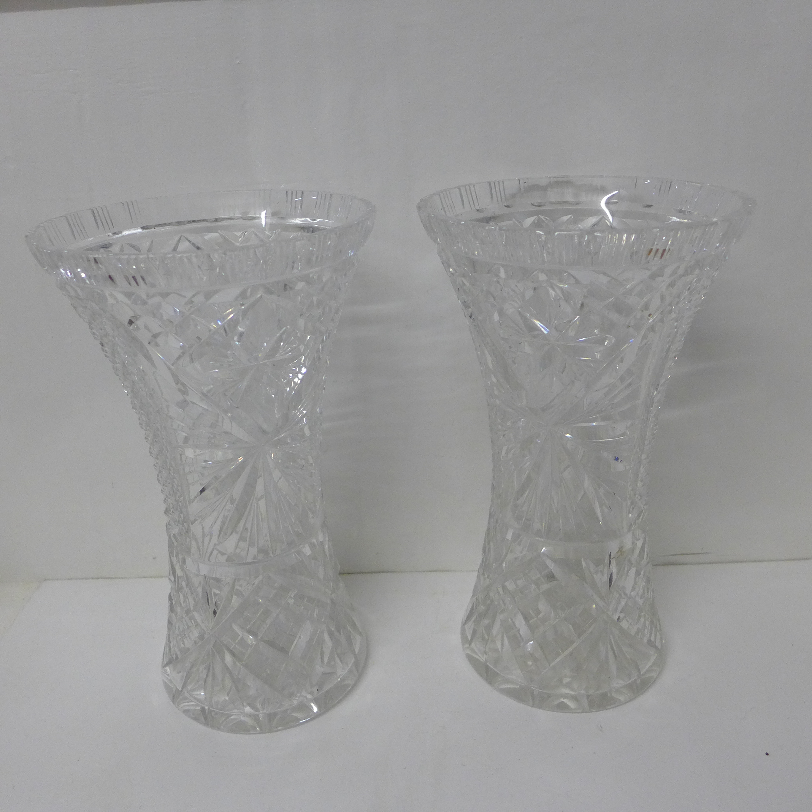 A pair of large crystal glass vases