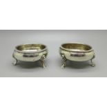 A pair of silver salts, 88g