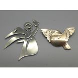 A Georg Jensen silver bird brooch, 320 shape mark and a Georg Jensen brushed steel Christmas